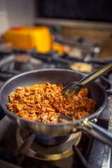 Pork cooking in the restaurant kitchen.
