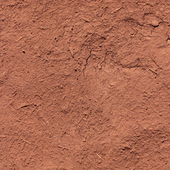 Square Brown texture of wall of rural Indian house made from clay mixed with cow dung.