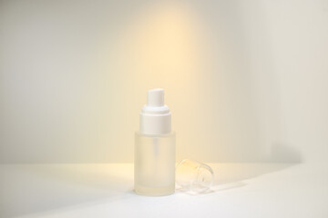 a bottle of spray Minimalist amber glass dropper bottle for essential oils, skincare serums, or cosmetic products isolated on white background