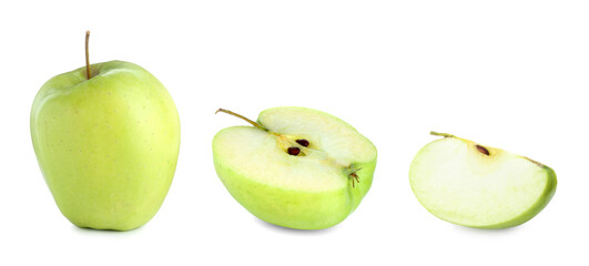 Whole and sliced green apple isolated on white