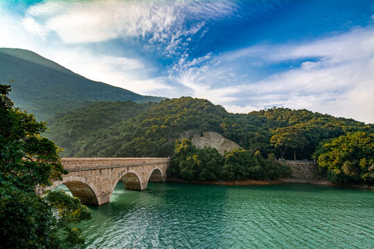 Tai Tam Reservoir in Hong Kong. It is surrounded by the Tai Tam Waterworks Heritage Trail which features heritage water facilities in Hong Kong.