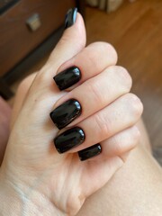 Fototapeta premium nail polish on a hand