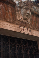 Carved  head over a dooray and entrance in Venice.
