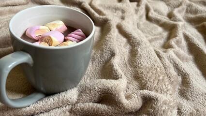 cup of hot drink with marshmallows