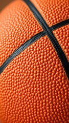 Fototapeta premium Close-up of textured basketball ball with vibrant orange color and intricate lines, orange, vibrant