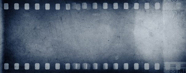 Film strip negatives blue background