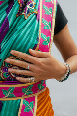 Close-up of Indian Traditional Beautiful young girl in saree posing outdoors. Happy Diwali greeting photo. Part of a series