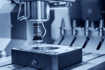 Quality control of drilling CMM in car engine. Milling CNC machinery with coordinate measuring...