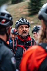 Rescue professional in helmet collaborates with team in wilderness, emphasizing safety and teamwork