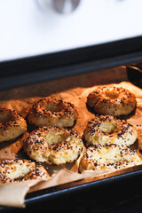 Freshly Baked Bagels Rising and Baking in the Oven, Creating a Comforting and Inviting Aroma