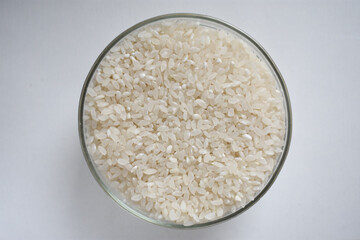 Plate with rice from above. Rice porridge in glass bowl isolated on white background with clipping path, top view