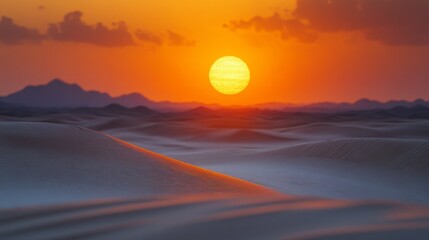 The sun sets over endless sand dunes, casting vibrant orange and red tones across the sky