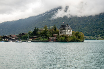 Overcast above the Iseltwalt peninsula and the Seeburg castle, Lake Brienz, Switzerland