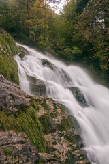 Fototapeta premium Long exposure of a cascade of the Giessbach Falls, Brienz, Switzerland