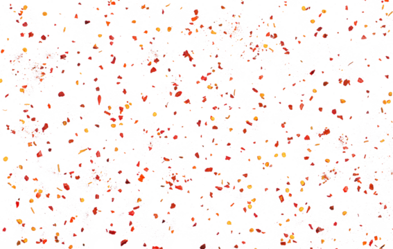 Spicy chili red pepper flakes flying, chopped, milled dry paprika pile isolated on white