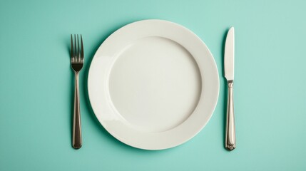 Minimalist Symmetry Elegant White Plate with Fork and Knife on Teal Background - Clean and Serene Dining Ambiance