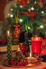 Christmas cozy magic details at table. Christmas eve prediction with candles.