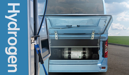 Hydrogen gas station and bus with an open hood and a hydrogen cylinder inside. Clean mobility...