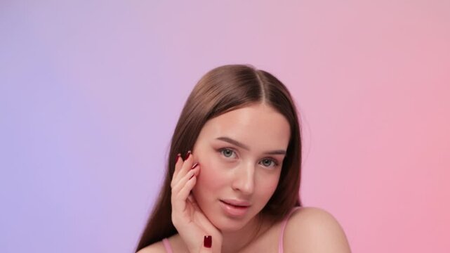 Portrait of attractive girl with healthy clean skin and beautiful make-up. Aesthetic cosmetology and makeup concept.