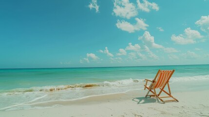 Lounge chair on a tropical beach with white sand, crystal clear sea, and vibrant colors