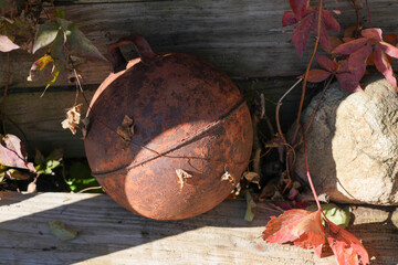Vintage Orange Rusted Steel Mooring Buoy Along the Niantic River Shoreline in Niantic, Connecticut