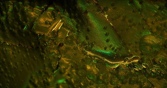 Bokeh background. Bumpy surface. Iridescent overflow on damaged relief texture. Quirky flashes with hypnotic color iridescence glowing fluid.