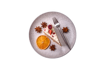 Piece of sweet layer cake with white cream, raspberries and strawberries