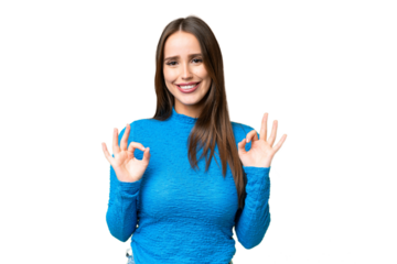 Young beautiful woman over isolated chroma key background showing ok sign with two hands