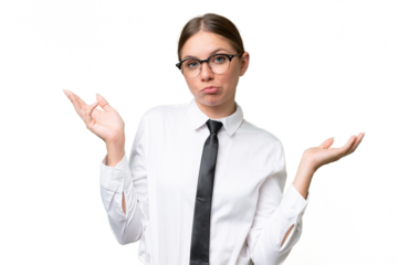 Young business caucasian woman over isolated background having doubts while raising hands