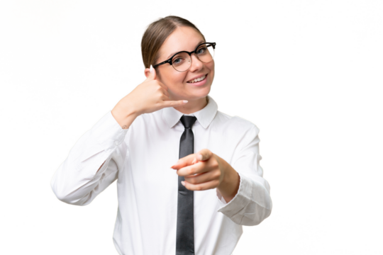 Young business caucasian woman over isolated background making phone gesture and pointing front