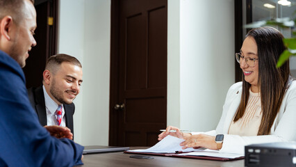 Professional business meeting with legal advisors at a modern office