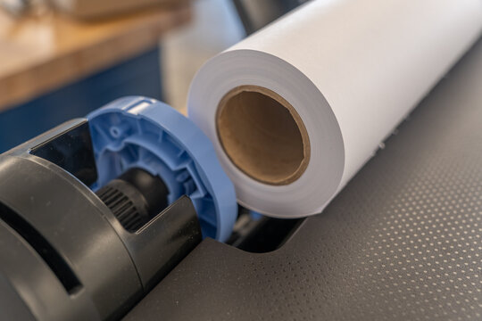 roll of printing paper installed on an ink jet printer