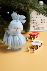 Blue Snowman Decoration with Miniature Sleds
