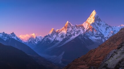 Fototapeta premium Panoramic view of Ama Dablam and snow peaks in Nepal after sunset