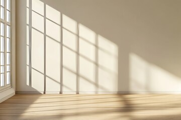 Sunlight casting window shadows on empty room wall