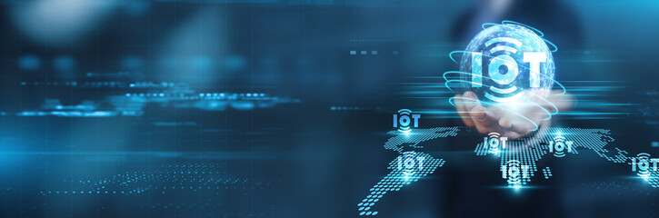 Hand holding with global network connection on Internet of Things (IoT), technology, and futuristic innovations, showcasing a connected world of smart devices and digital advancements