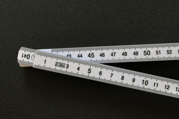 White folding rule. Centimeter measurement for the metric system.