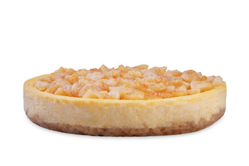 Cheesecake with caramelized cinnamon apple slices on a white isolated background