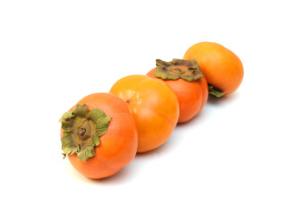 Stack persimmon fruits isolated on white background