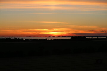 Fototapeta premium sunset over the river