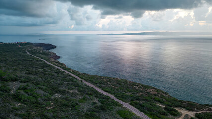 Panorama of Portoscuso, Sardinia. Cycle path and clear sea.