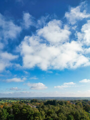 Obraz premium High Angle British Agricultural Farms at Gorgeous Countryside Landscape of Northamptonshire England Great Britain of United Kingdom. Drone's Camera View from High Altitude on October 25th, 2023