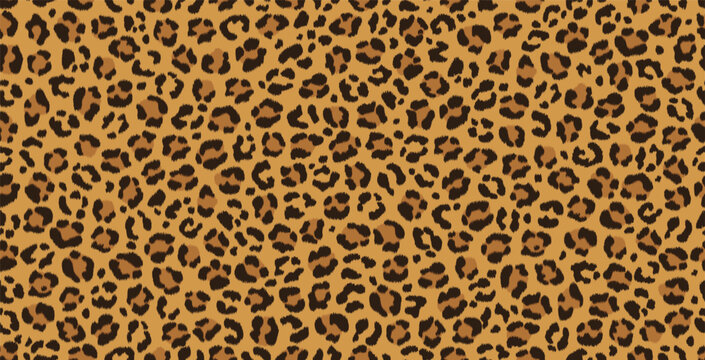 Seamless detailed leopard print pattern on a yellow background.
