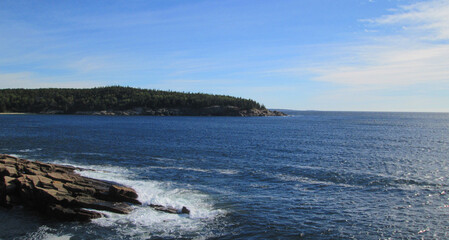 waves breaking on ocean rocks