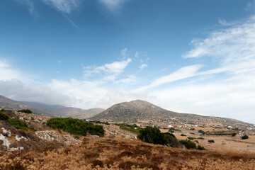 View of rural area in Paros, with the mountains in the background