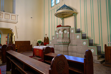 Decorative stone pulpit in Reformed christian church in Bratislava, Slovakia
