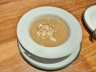 Three Mushrooms Soup. Soup with shiitake mushroom, golden needle mushroom and eryngii mushroom. Healthy food