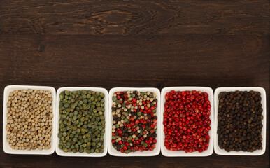 Bowls of assorted peppercorns
