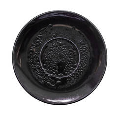 a black saucer with water droplets isolated on a white background. copy space and flatlay.