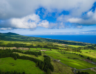 Scenic landscape with mountains and ocean of Sao Miguel Island, Azores, Portugal. Aerial drone view of panoramic Acores islands